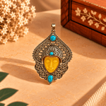Dije de Bronce Anaya con Rostro Amarillo y Piedras Turquesas - BOUTIQUEDELAINDIA
