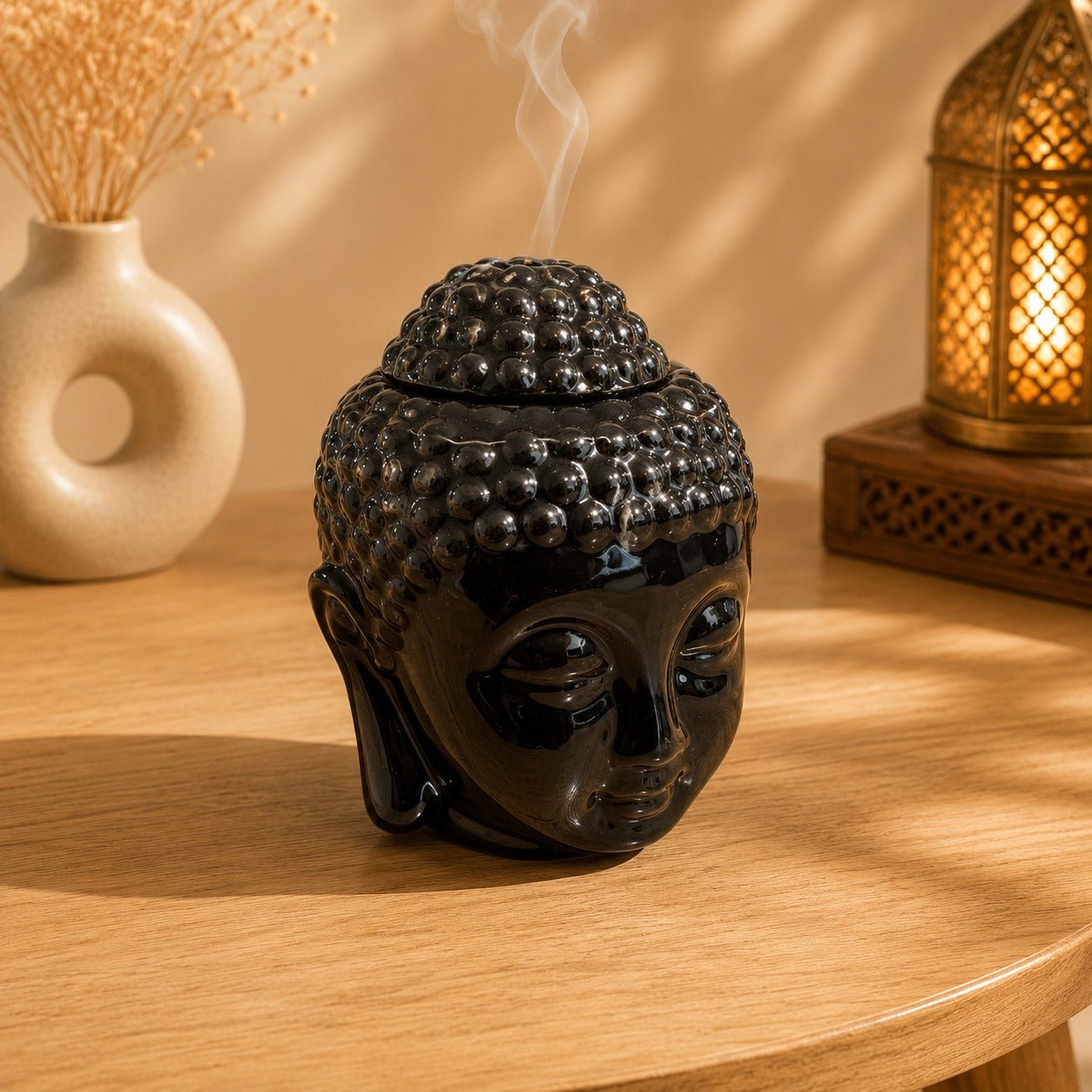 Quemador de Aceites Esenciales Cabeza de Buda Negro - BOUTIQUEDELAINDIA